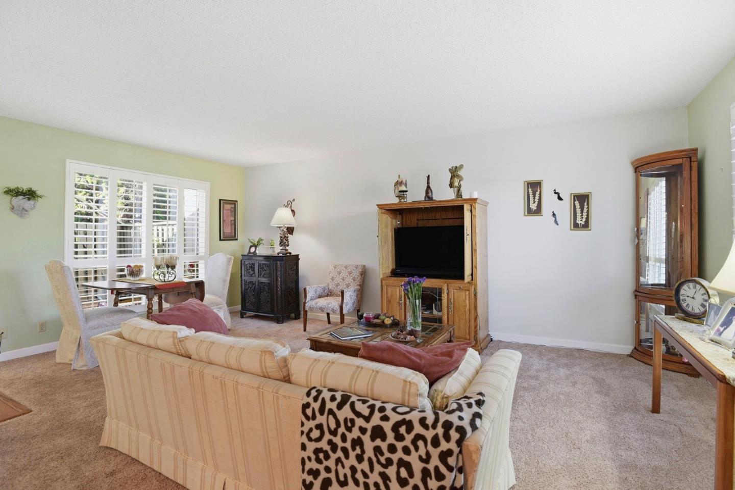 815 Rigel Lane Foster City, CA 94404 - Photo 10 of 48 a living room with furniture and a flat screen tv