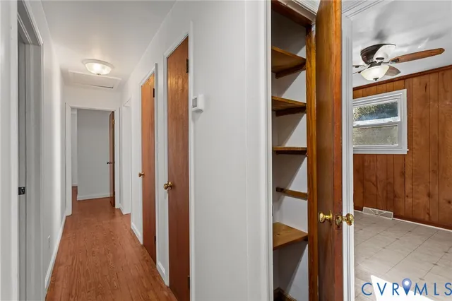 a en suite bathroom with a sink double vanity and a mirror