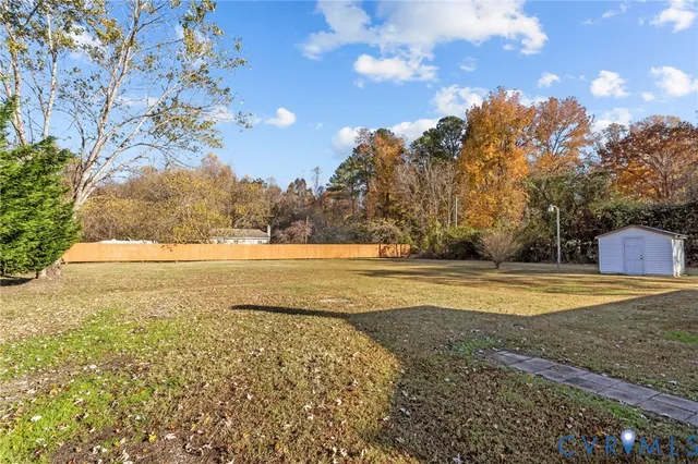 an aerial view of residential house and parking space