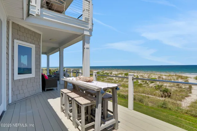 a bathroom with a large tub a shower and sink