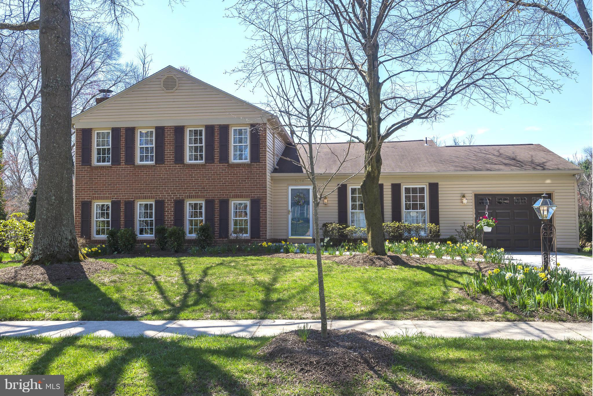 5054 Whetstone Road Columbia, MD 21044 - Photo 1 of 30 a front view of a house with a yard