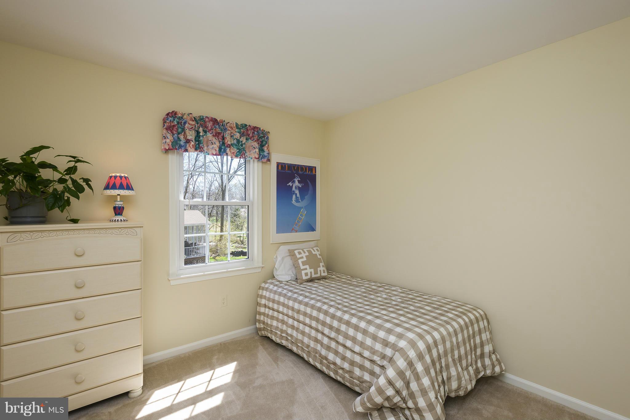 5054 Whetstone Road Columbia, MD 21044 - Photo 24 of 30 a bedroom with a bed and a window
