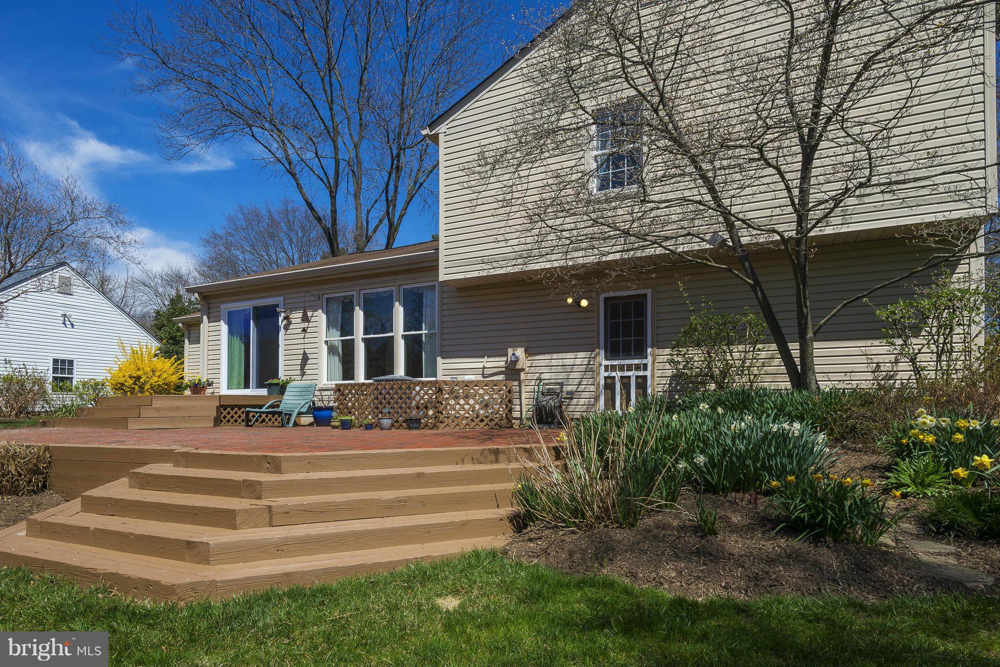 5054 Whetstone Road Columbia, MD 21044 - Photo 5 of 30 a front view of a house with a garden