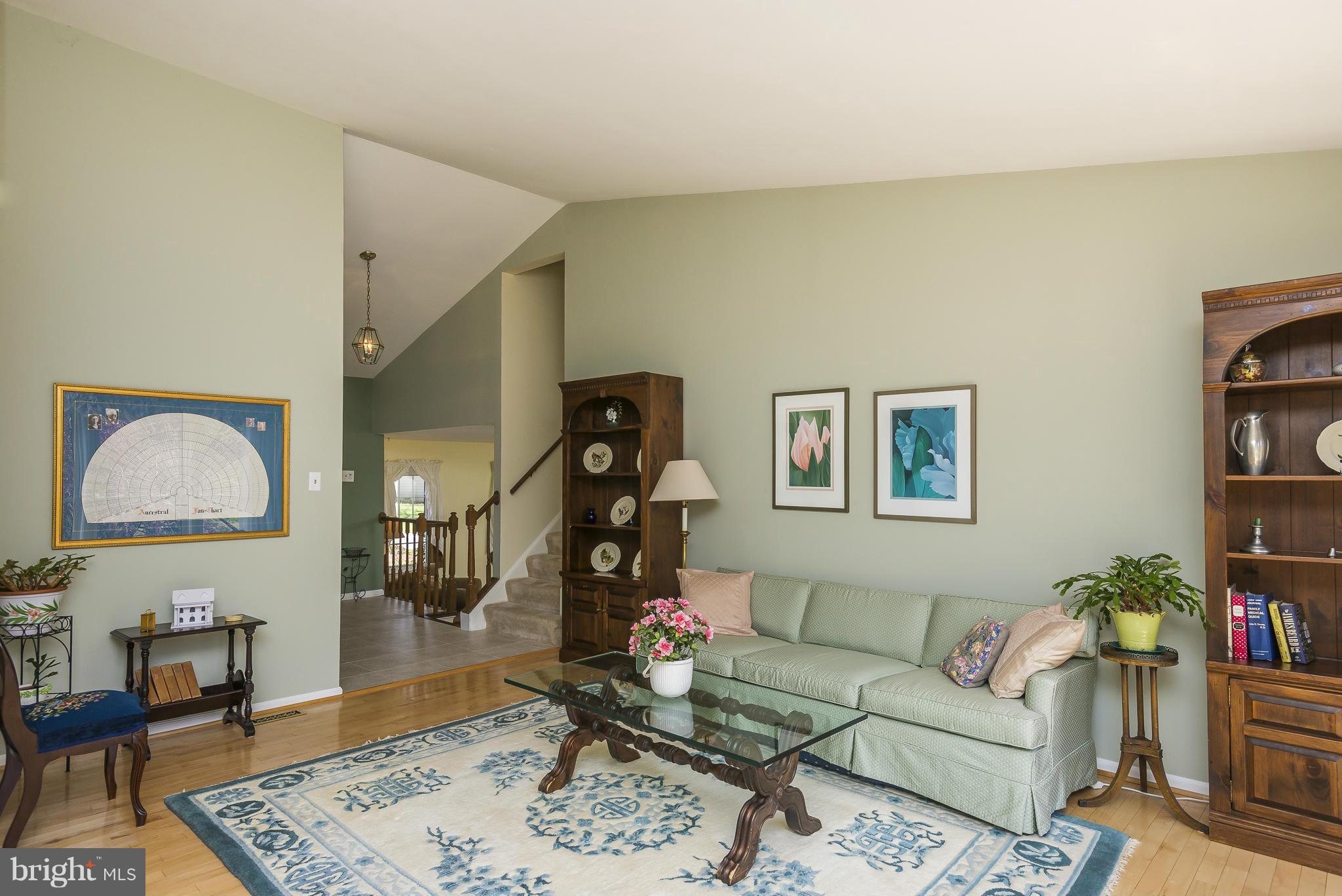 5054 Whetstone Road Columbia, MD 21044 - Photo 7 of 30 a living room with furniture and wooden floor