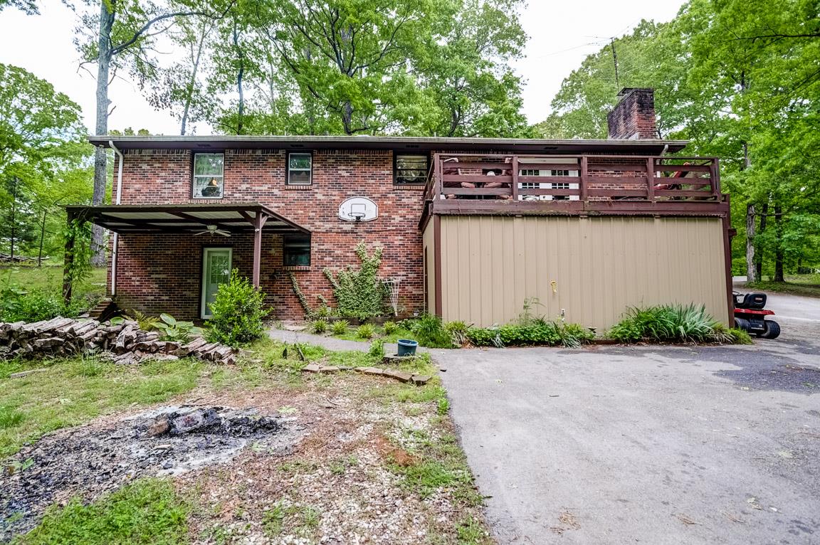 7973 Ridgewood Road Goodlettsville, TN 37072 - Photo 28 of 30 Back of Home with Covered Patio and Storage.