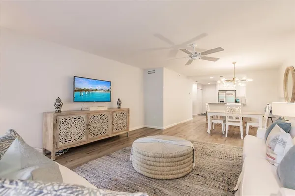 a living room with furniture and a table