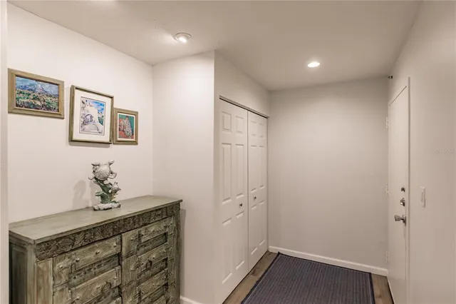 a bathroom with a sink a mirror and vanity