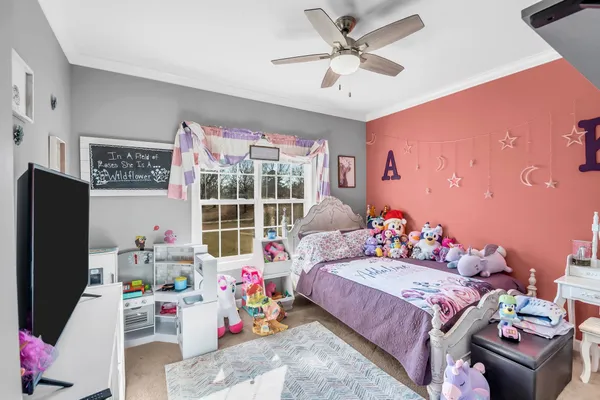 a bathroom with a sink vanity and mirror