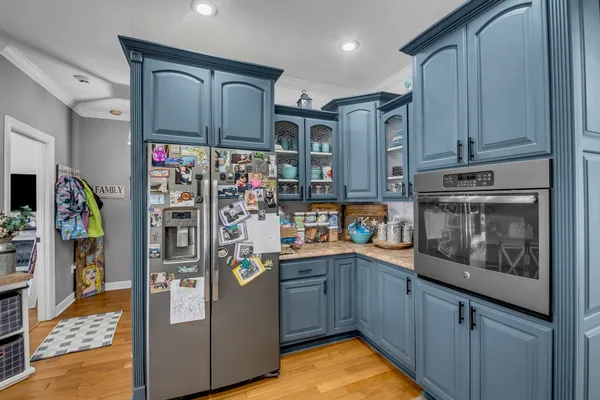 a view of a house with snow on the road
