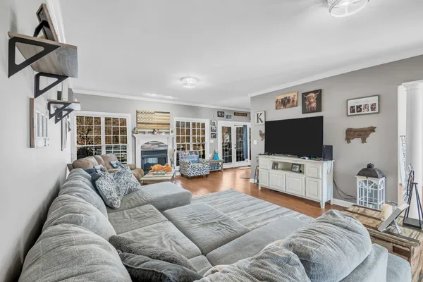 a spacious bathroom with a double vanity sink and a mirror