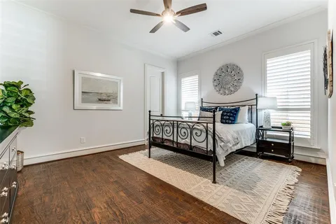 a bed room with a bed and a window