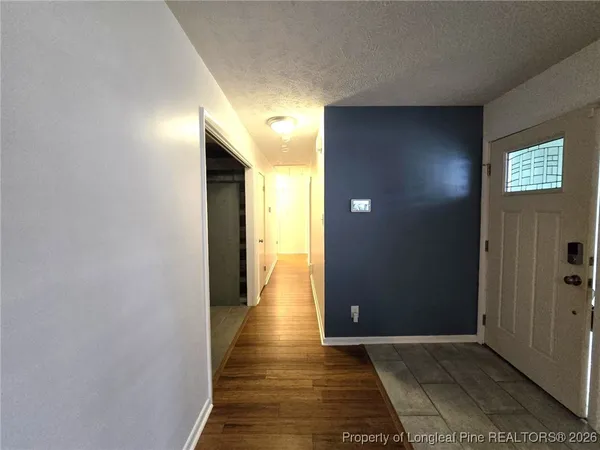a view of hallway with stairs