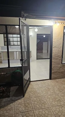 a view of a living room with furniture