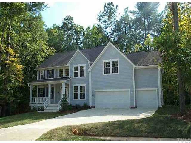 5313 Indigo Moon Way Raleigh, NC 27613 - Photo 1 of 1 a front view of a house with a yard