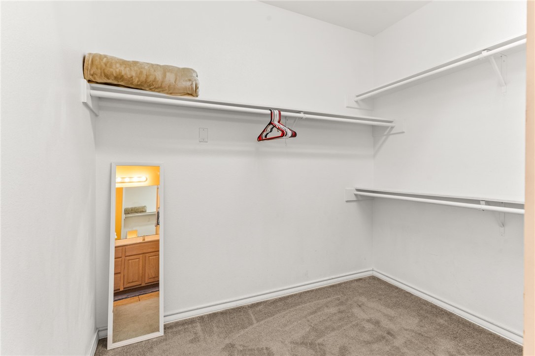 14427 Compass Street, Unit B14 Corpus Christi, TX 78418 - Photo 13 of 25 a view of walk in closet with empty racks
