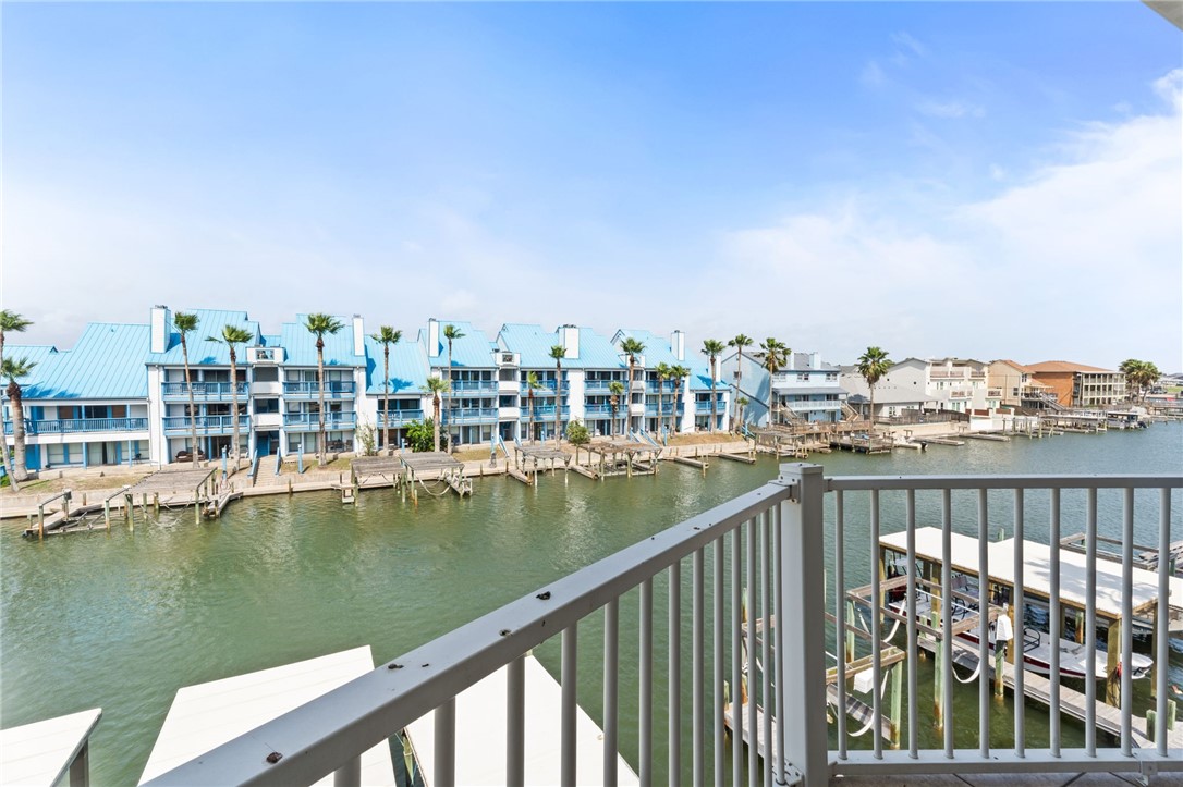 14427 Compass Street, Unit B14 Corpus Christi, TX 78418 - Photo 19 of 25 a view of swimming pool from a balcony