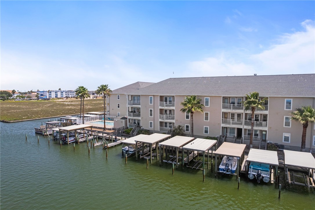 14427 Compass Street, Unit B14 Corpus Christi, TX 78418 - Photo 24 of 25 a view of a lake with outdoor space