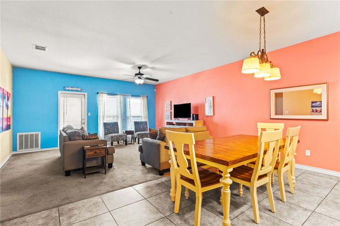14427 Compass Street, Unit B14 Corpus Christi, TX 78418 - Photo 8 of 25 a view of a dining room with furniture window and outside view
