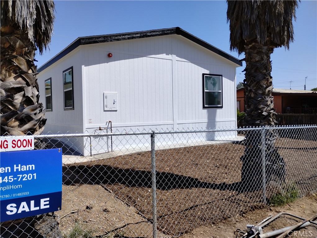 22678 La More Road Perris, CA 92570 - Photo 2 of 15 a front view of a house