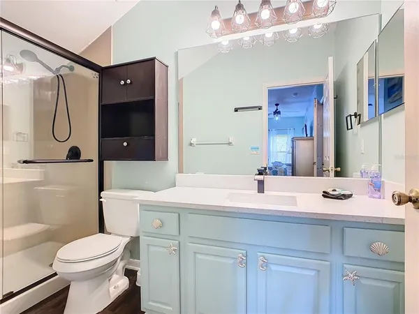 a kitchen with stainless steel appliances a sink and cabinets