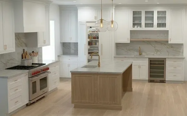 a kitchen with stainless steel appliances granite countertop a stove and a refrigerator