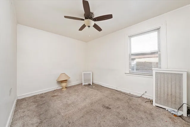 a view of a room with rack on the wall