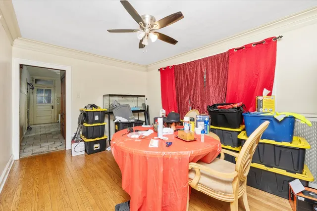 a dining room with a table and chairs