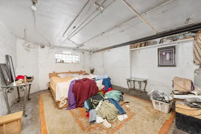 a bed room with a bed and a couch