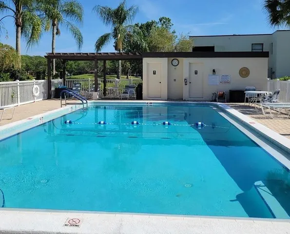 a bathroom with a sink and a large window