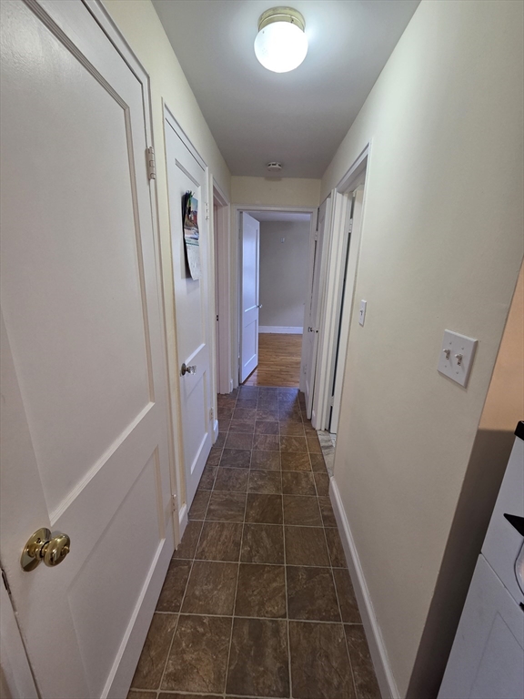 72 Barstow Street, Unit 1 Salem, MA 01970 - Photo 9 of 12 a view of a hallway
