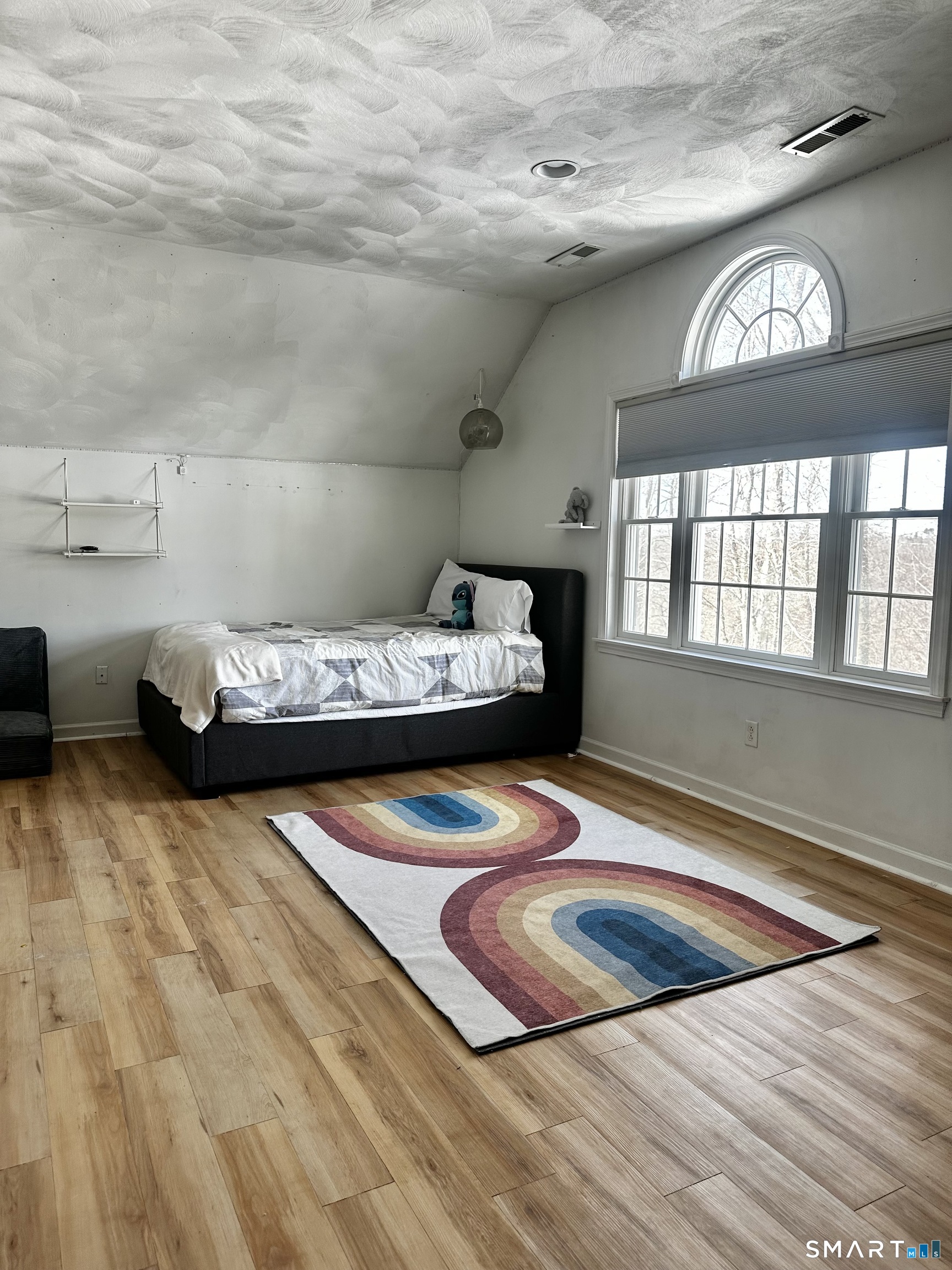 9 Leeward Lane Groton, CT 06340 - Photo 15 of 18 a bedroom with a bed and a window