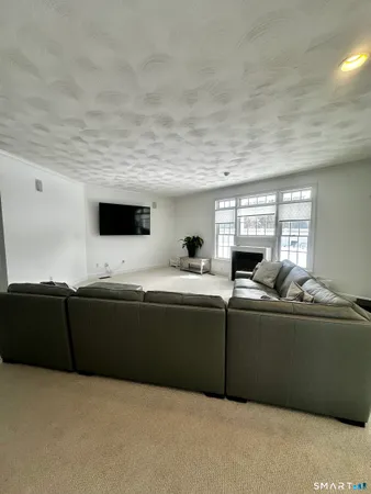a living room with hard wood floor