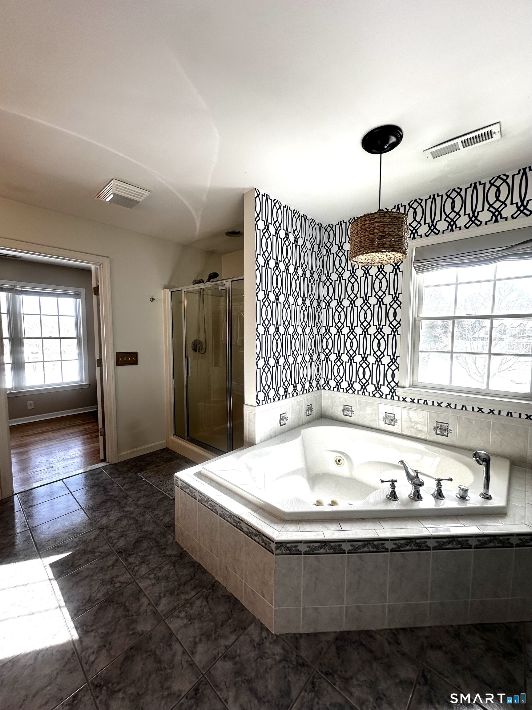 9 Leeward Lane Groton, CT 06340 - Photo 8 of 18 a spacious bathroom with a tub and sink