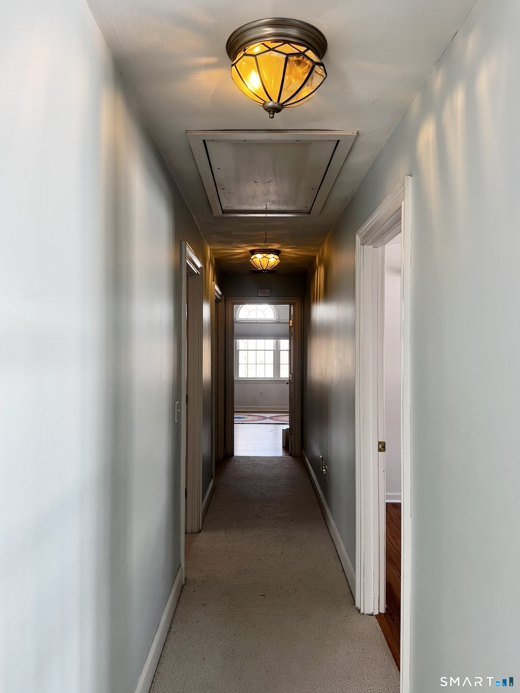 9 Leeward Lane Groton, CT 06340 - Photo 9 of 18 a view of a hallway with a hallway