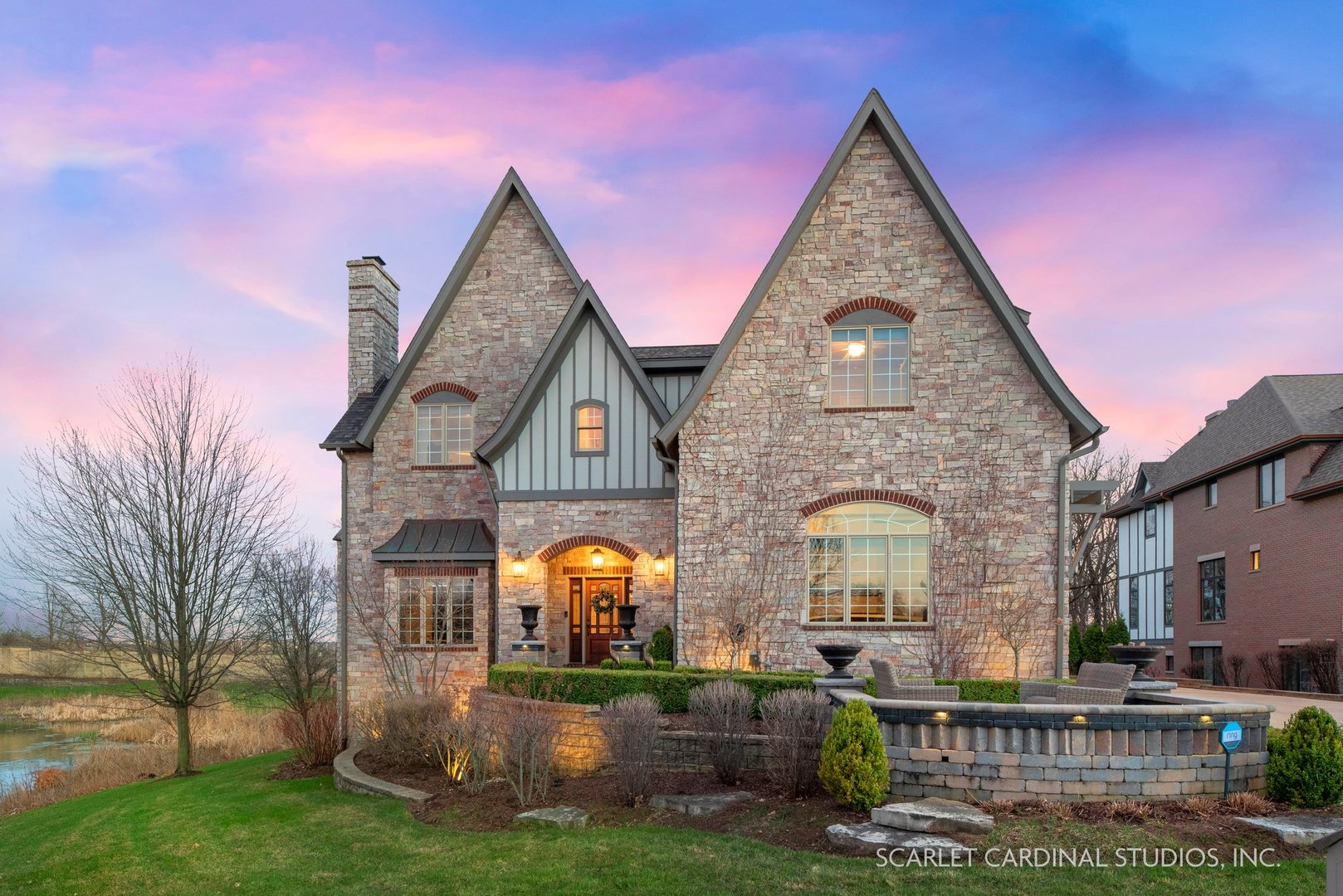 a front view of a house with garden