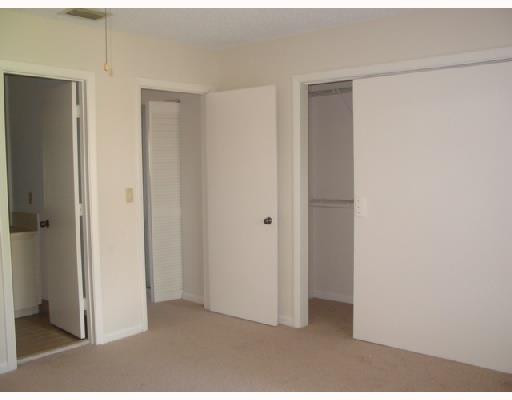 8954 West Sample Road, Unit 8954 Coral Springs, FL 33065 - Photo 9 of 14 Master Bedroom