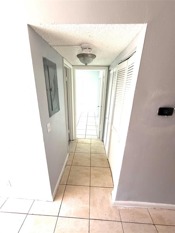 7480 Southwest 10th Court, Unit 1 North Lauderdale, FL 33068 - Photo 7 of 9 a bathroom with a sink and a mirror