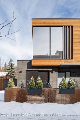 a front view of a house with a porch