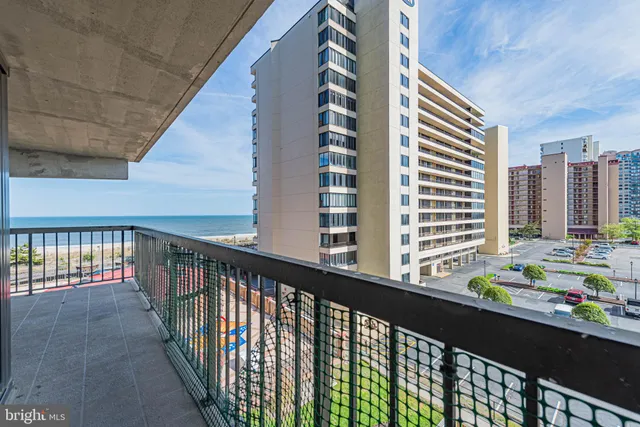 a view of a city with tall buildings