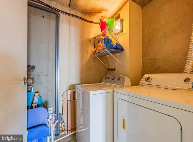 a front view of a house with a yard and a garage