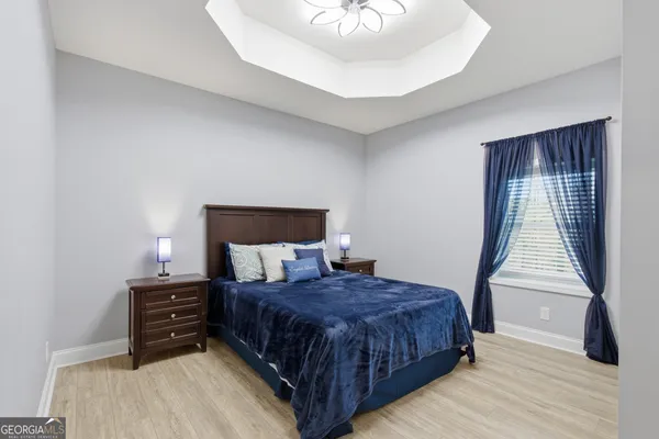 a bathroom with a sink vanity and a mirror