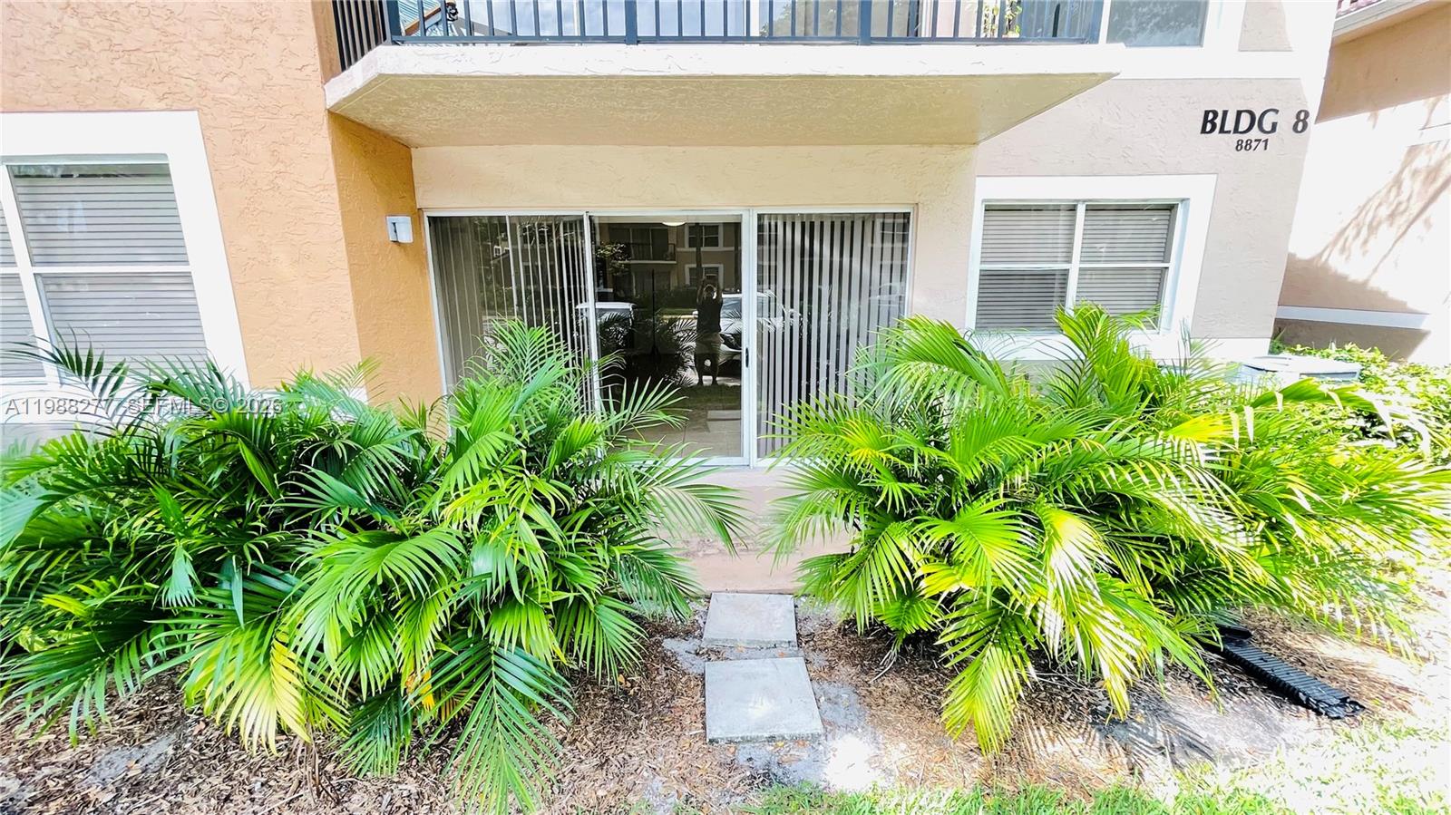 8871 Wiles Road, Unit 105 Coral Springs, FL 33067 - Photo 21 of 43 a view of a entryway front of house
