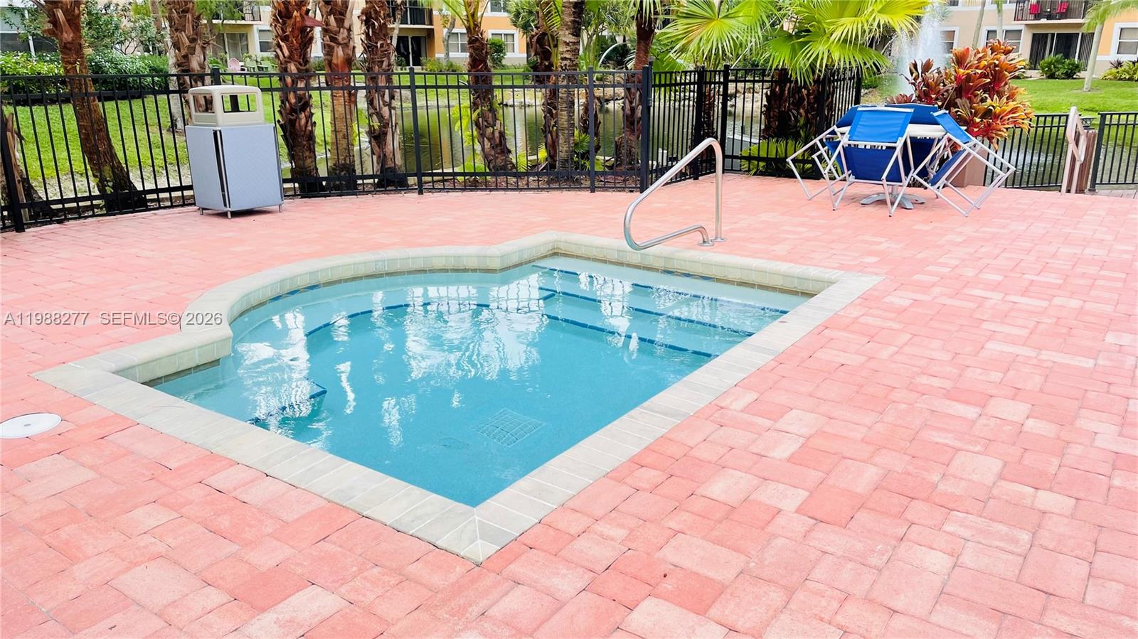 8871 Wiles Road, Unit 105 Coral Springs, FL 33067 - Photo 30 of 43 a view of outdoor space with seating area