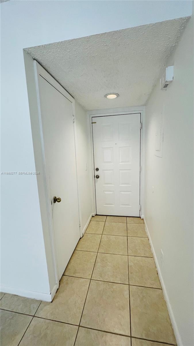8871 Wiles Road, Unit 105 Coral Springs, FL 33067 - Photo 40 of 43 a view of an empty room