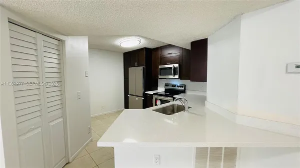 $2,100 | 8871 Wiles Road, Unit 105, Coral Springs, FL 33067