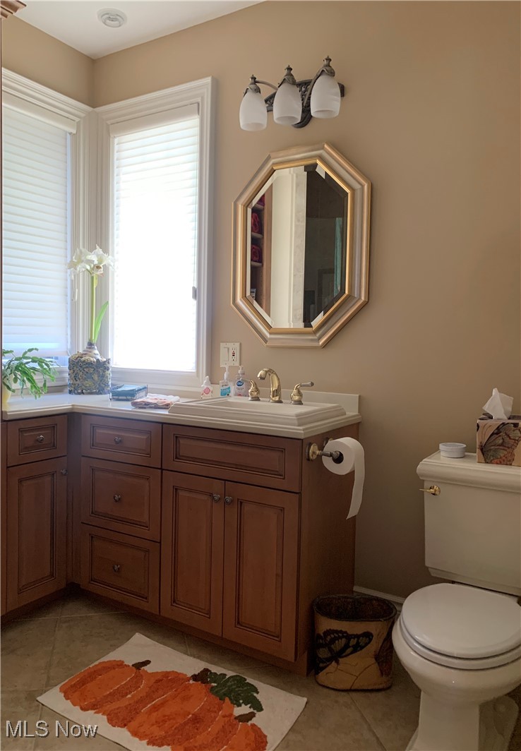 939 Cedar Point Road Sandusky, OH 44870 - Photo 22 of 50 First Floor Bathroom just off the Kitchen