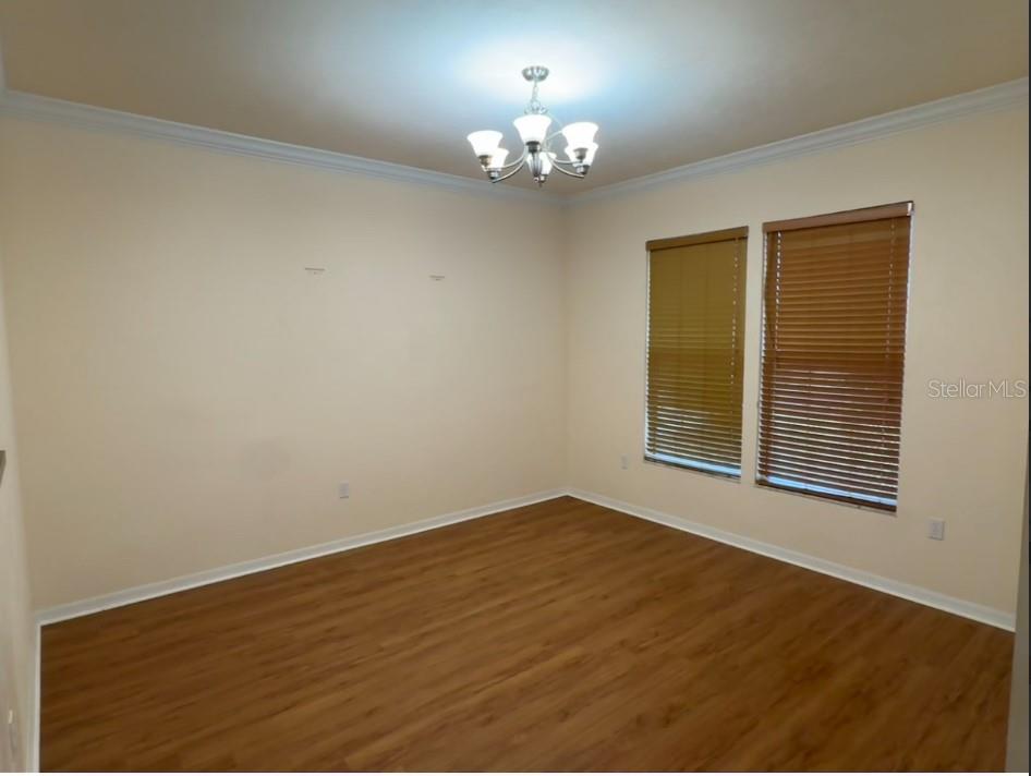 2074 Northwest 101st Street Gainesville, FL 32606 - Photo 3 of 16 a view of an empty room with a window