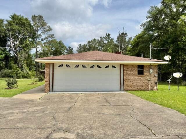 234 Joe Magee Road Columbia, MS 39429 - Photo 43 of 54 Side view/paved parking