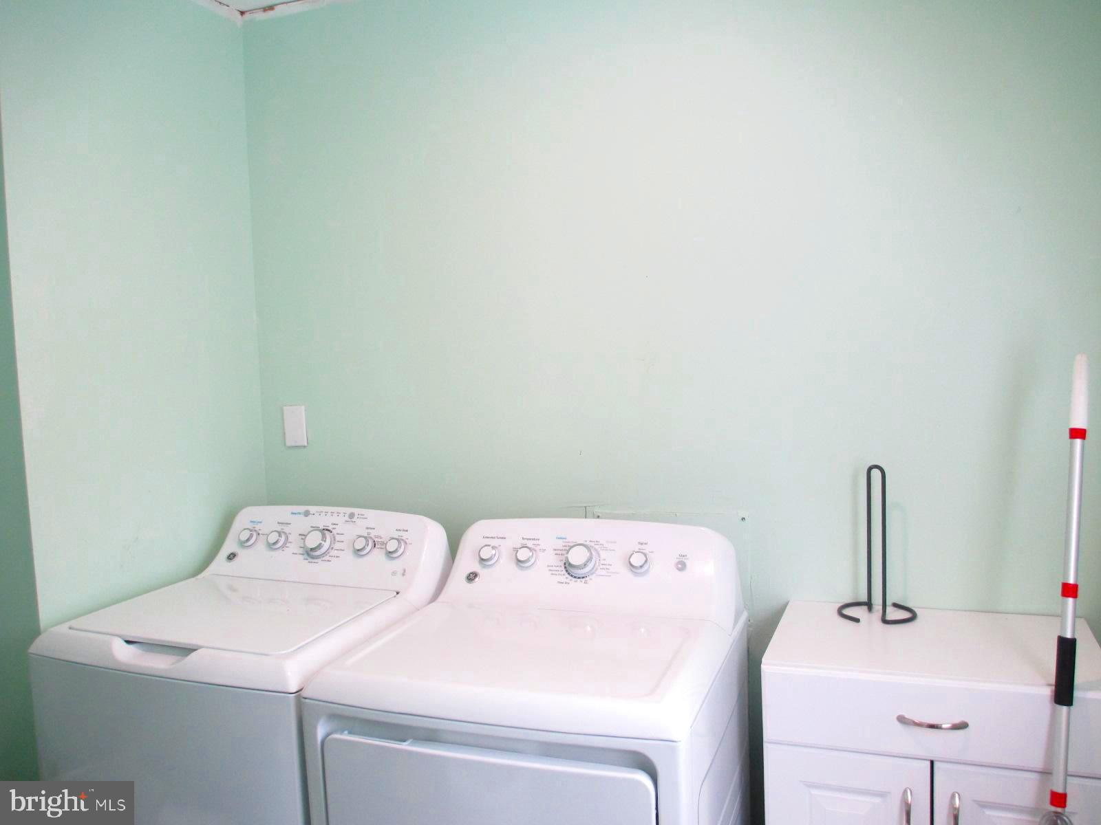 25241 Porters Grove Road Worton, MD 21678 - Photo 12 of 22 a utility room with dryer and washer