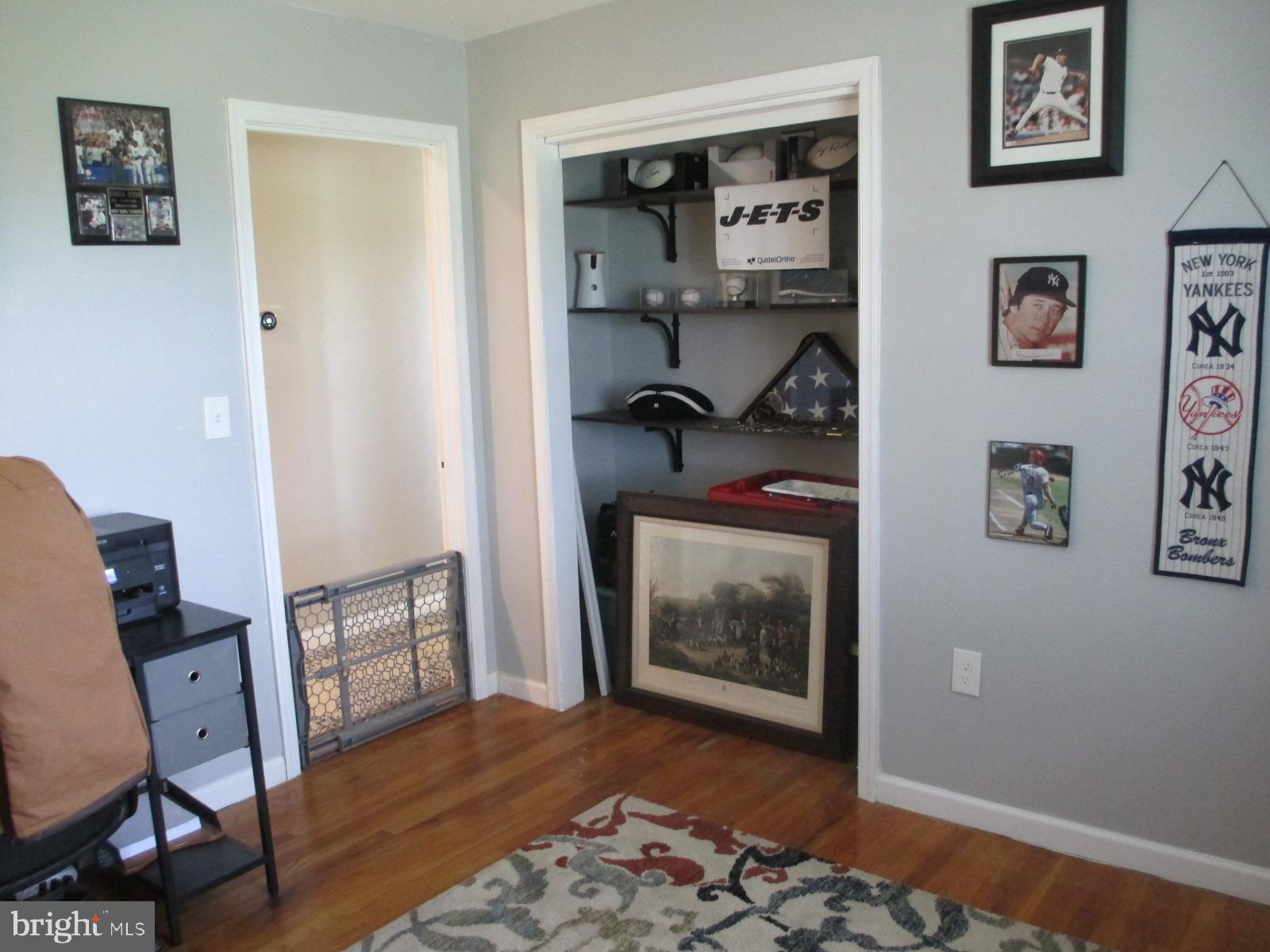 25241 Porters Grove Road Worton, MD 21678 - Photo 14 of 22 a living room with furniture and wooden floor